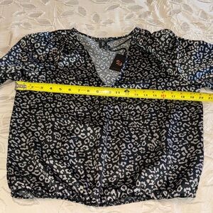 NWT black and gray cheetah print long sleeved blouse